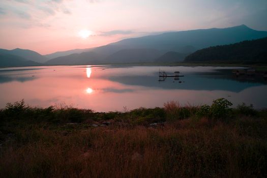 Panorama scene of Lake Mountain Sunset.  Landscape at dusk .beautiful sky at sunset in autumn. Perfect mountains at sunrise and sunset time. Beautiful scenery