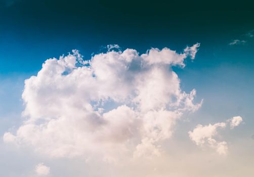 Fluffy White Clouds in A Blue Sky. Abstract background graphic design