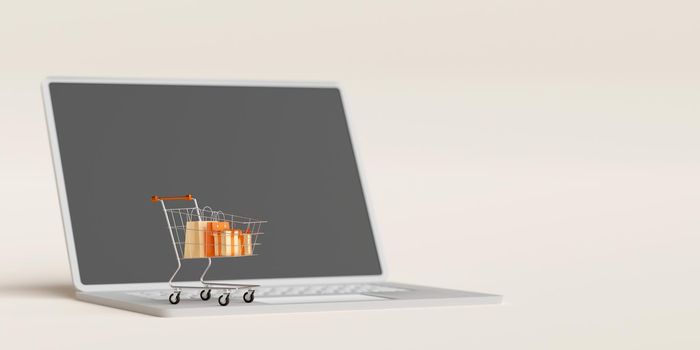 Shopping online concept, Shopping bag and gift box in shopping cart on laptop, 3d illustration