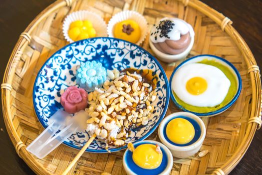 Thai traditional dessert in weave basket. The most popular dessert in Thailand. The original Thai desserts sweets.