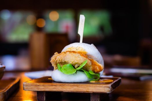 Selective focus Hirata Buns. Japanese traditional food. Asian cuisine made from steamed buns stuffed with salad and delicious savory fillings,   sandwiches or tacos
