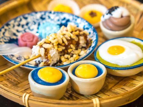 Thai traditional dessert in weave basket. The most popular dessert in Thailand. The original Thai desserts sweets.