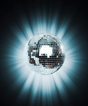 Shining Disco Ball on blue background light rey