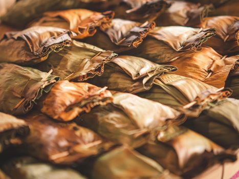 Thai traditional dessert. Grilled Taro Stuffed Coconut Sticky Rice