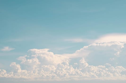 white fluffy cumulus cloud against blue sky abstract nature weather season background