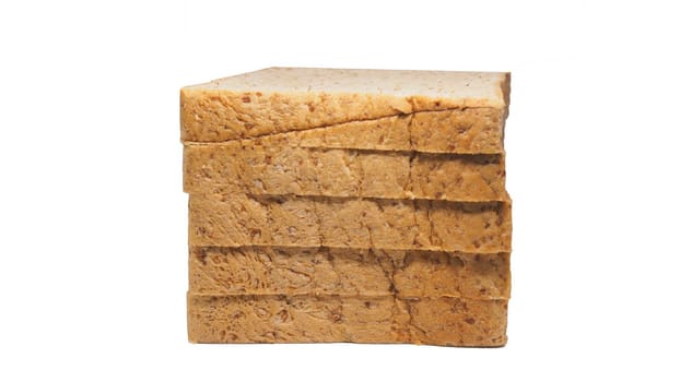 Toast bread stands in a row close-up  Isolated white background  with clipping path
