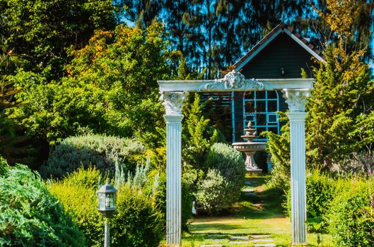 Stunning Entrance Portico Gate classic style decoration of a Public Garden. Column Stone structure element in classic architecture detail