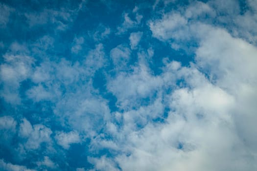 Blue Sky Background With White Clouds. Abstract season weather.