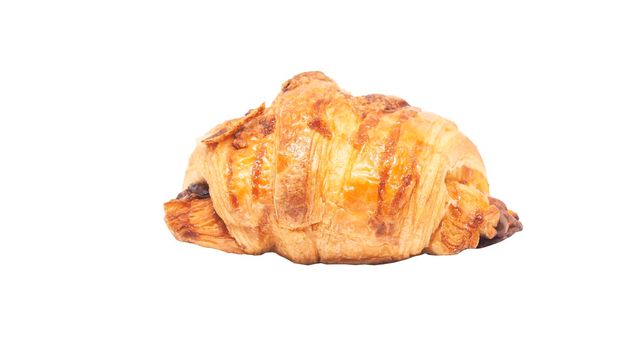 Plain croissant on isolated white background with clipping path. Food still life objct.