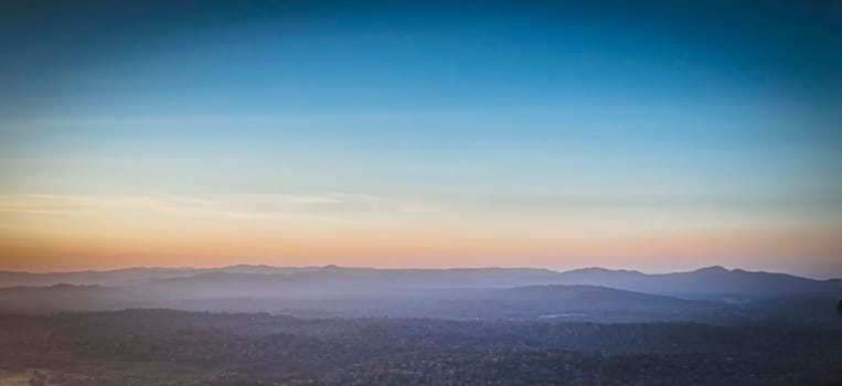 Panorama of a beautiful landscape with mountain ranges at sunset.  At Khao Yai National Park Thailand