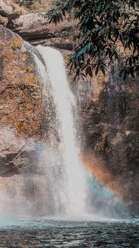 Rainbow waterfall in Haew Suwat Waterfall in Khao Yai National Park Thailand.