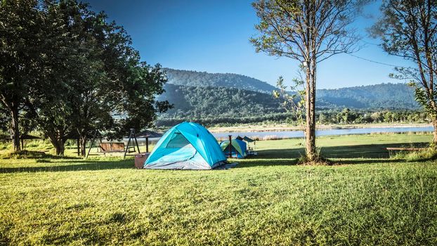 tourist tent camping in mountains near lake, Khao Yai National park, Thailand