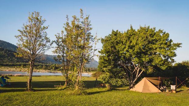 tourist tent camping in mountains near lake, Khao Yai National park, Thailand