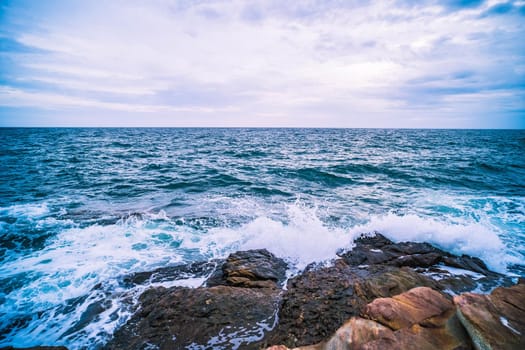 Sea with Smooth Wave and Rock landscape. Nature of Seascape in vacation holiday travel relax time.