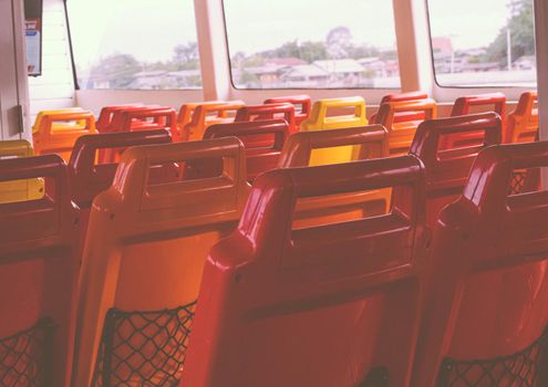 Hot colorful of Empty Seats on a Ferry boat for travel along Chao Phraya River.