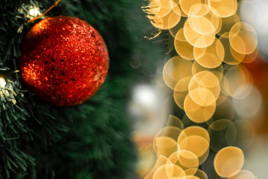 Christmas Tree red Ball And  gold Bokeh Background.