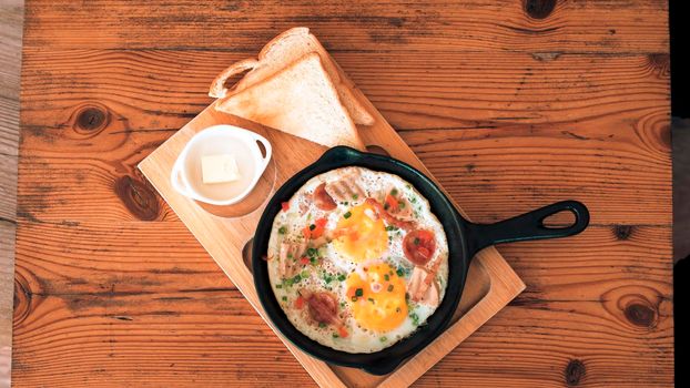 Bread with Pan Fried Egg with Toppings for breakfast