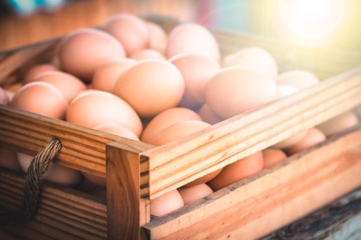 Fresh farm egg in wooden box heathy concept idea farming bussiness.