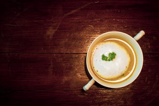 Mushroom Soup in ceramic bowl breakfast meal healthy on the wooden table.