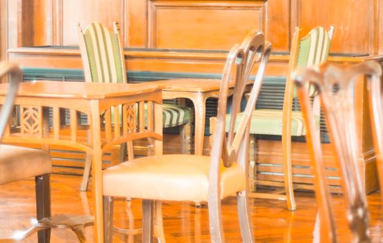 Morning light through rows of  Empty table and chairs in cafe restaurant