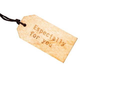 wooden tag label with string isolated on white background with clipping path