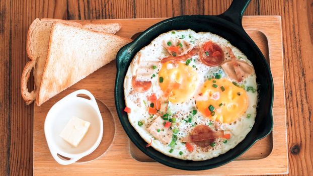 Bread with Pan Fried Egg with Toppings for breakfast