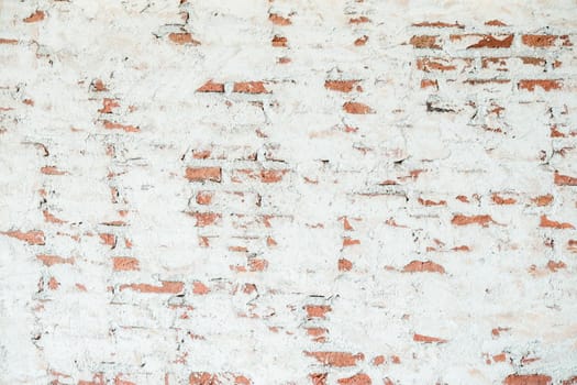 Old chipped white brick wall texture background. Vintage Wide Old Red White Brick Wall Texture Background. whitewashed grungy brick wall, abstract red white vintage background