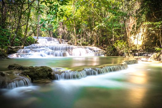 Long exposure of Huay Mae Khamin Waterfall in Srinakarin Dam National Park. Kanchanaburi Thailand. cascade waterfall tropical forest