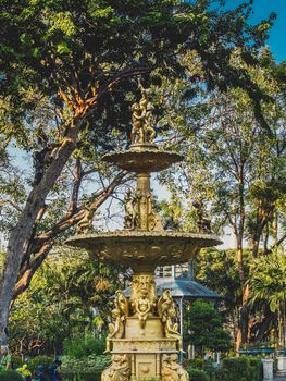 Three Tiered Water outdoor garden  Fountains in morning sunlight spring summer time