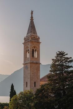 Beautiful view of the coast of Kotor Bay and St.Eustace's Church in the village Dobrota in Montenegro. Church of St. Eustachius is located in Dobrota , Kotor Montenegro