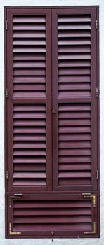 Old wooden vintage louver window. Blinds Window Shutter Plantation Shutter in brown.