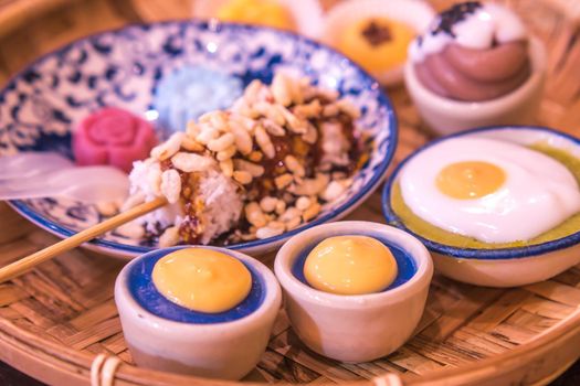 Thai traditional dessert in weave basket. The most popular dessert in Thailand. The original Thai desserts sweets.