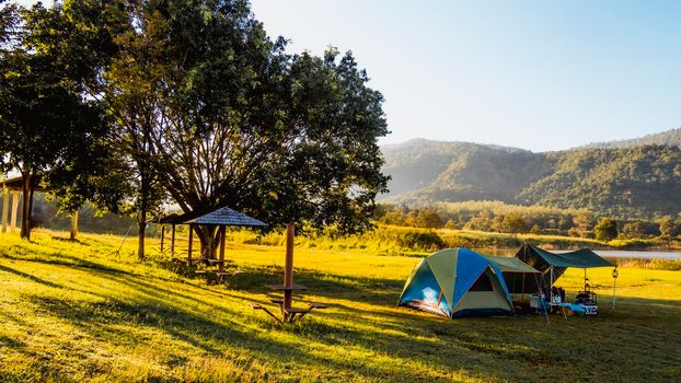 tourist tent camping in mountains near lake, Khao Yai National park, Thailand