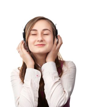 Girl listening to music in headphones
 isolated on white background