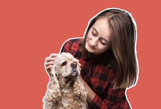Young american cocker spaniel and beautiful woman. Magazine style collage with copy space and trendy coral color background