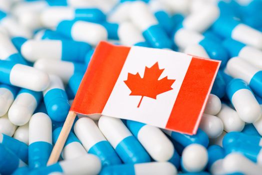 Flag of Canada on huge amount of pills