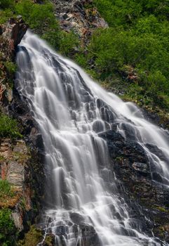 Horsetail Falls cascade down the cliffs of Keystone Canyon outside Valdez in Alaska