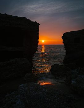 Sunset over old demolished military forts. Abandoned fortifications at Baltic sea coast in Liepaja, Latvia.