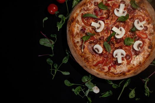 Tasty pepperoni pizza with mushrooms. Top view with copy space. Banner.