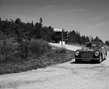 URBINO, ITALY - JUN 16 - 2022 : CISITALIA 202 SC BERLINETTA PININ FARINA 1948 on an old racing car in rally Mille Miglia 2022 the famous italian historical race (1927-1957