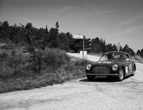 URBINO, ITALY - JUN 16 - 2022 : CISITALIA 202 SC BERLINETTA PININ FARINA 1948 on an old racing car in rally Mille Miglia 2022 the famous italian historical race (1927-1957