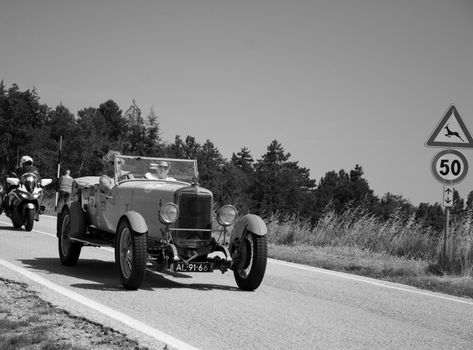 URBINO, ITALY - JUN 16 - 2022 : SUNBEAM 3 LITRE TWIN CAM SUPER SPORT 1926 on an old racing car in rally Mille Miglia 2022 the famous italian historical race (1927-1957