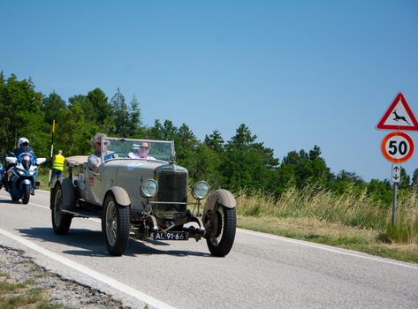 URBINO, ITALY - JUN 16 - 2022 : SUNBEAM 3 LITRE TWIN CAM SUPER SPORT 1926 on an old racing car in rally Mille Miglia 2022 the famous italian historical race (1927-1957