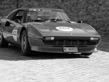 URBINO, ITALY - JUN 16 - 2022 : FERRARI TRIBUTE Ferrari 308 Gts IN an old racing car in rally Mille Miglia 2022