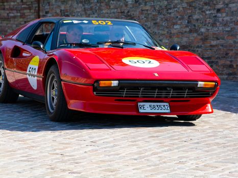 URBINO, ITALY - JUN 16 - 2022 : FERRARI TRIBUTE Ferrari 308 Gts IN an old racing car in rally Mille Miglia 2022