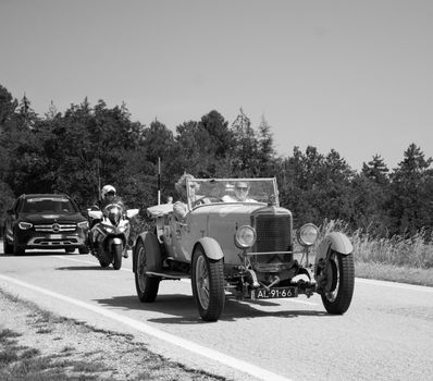 URBINO, ITALY - JUN 16 - 2022 : SUNBEAM 3 LITRE TWIN CAM SUPER SPORT 1926 on an old racing car in rally Mille Miglia 2022 the famous italian historical race (1927-1957