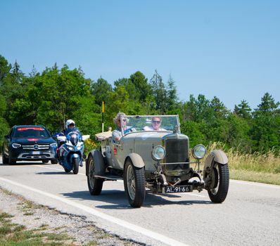 URBINO, ITALY - JUN 16 - 2022 : SUNBEAM 3 LITRE TWIN CAM SUPER SPORT 1926 on an old racing car in rally Mille Miglia 2022 the famous italian historical race (1927-1957