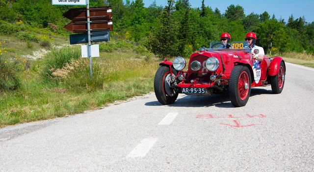 URBINO, ITALY - JUN 16 - 2022 : ASTON MARTIN 2 LITRE SPEED MODEL 1937 on an old racing car in rally Mille Miglia 2022 the famous italian historical race (1927-1957