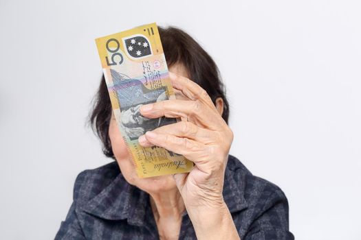 elderly woman has little money