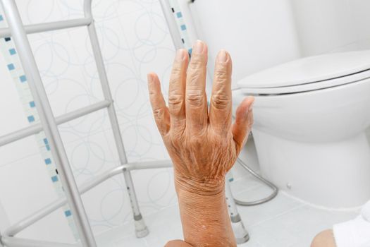 Elderly woman falling in bathroom because slippery surfaces